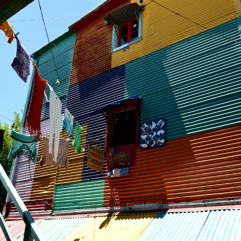 Is Buenos Aires’ colorful La Boca neighborhood overrated or worth a visit? Find out more - Becci Abroad