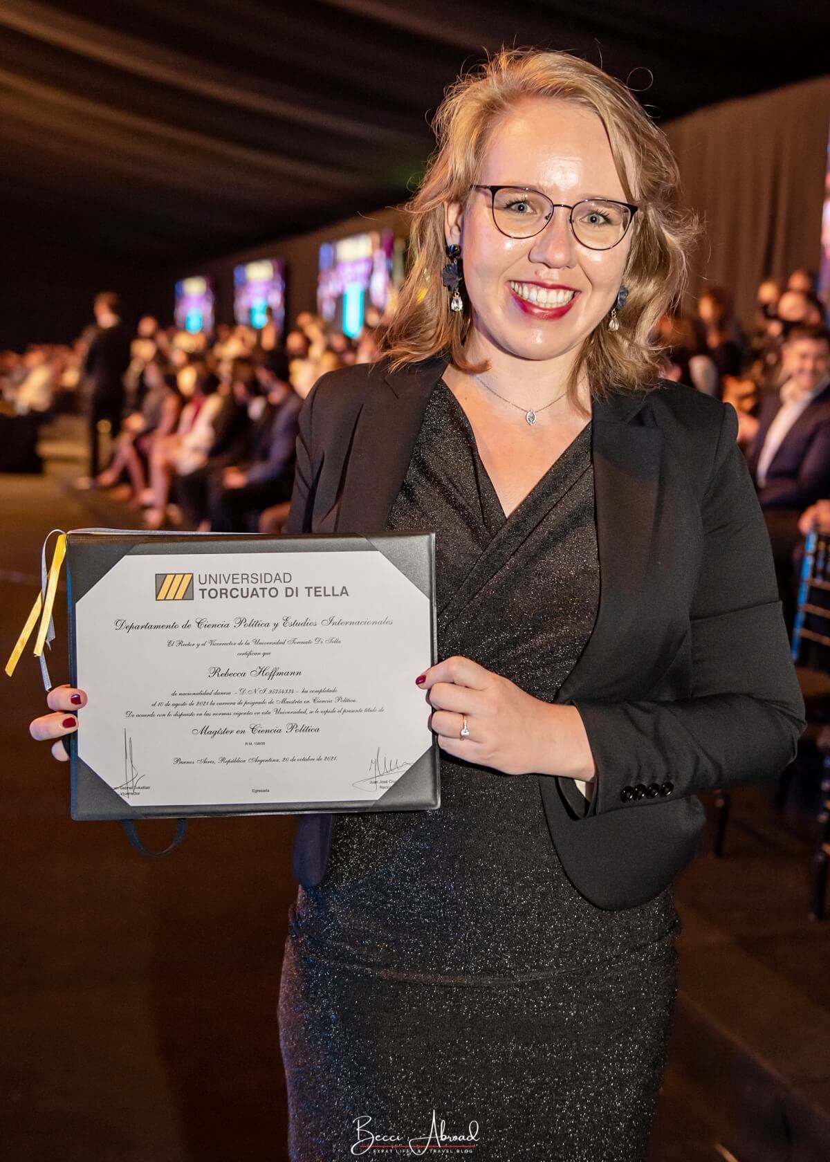 International student with her University diploma from studying abroad in Argentina