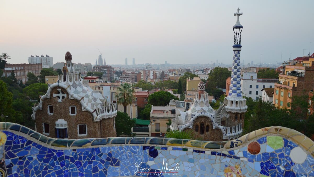 The whimsical roofs of the Porter’s Lodge Pavilion at the entrance of Park Güell, showcasing Gaudí’s unique blend of architecture and fantasy.