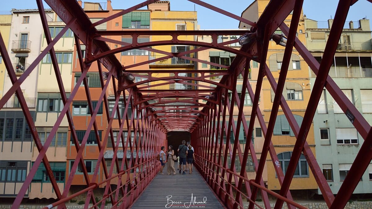 Taking photos on the Eiffel Bridge in Girona