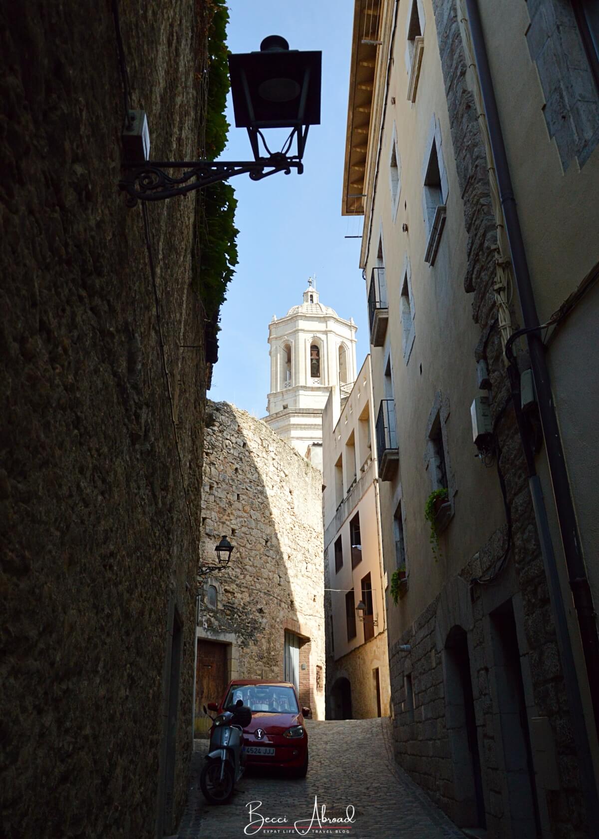 Medieval cobblestoned streets in Girona - a perfect day trip from Barcelona