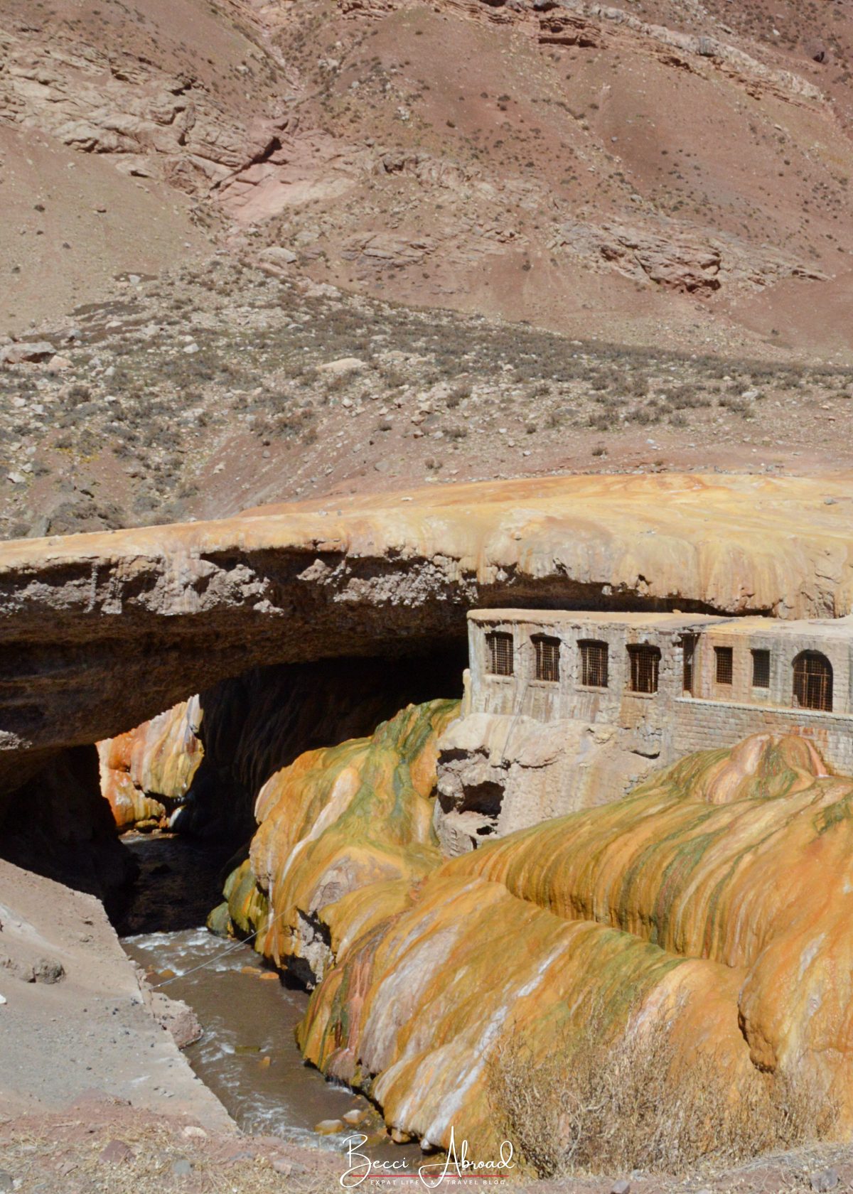 The natural arch of Puente del Inca with bright mineral colors in the Andes Mountains