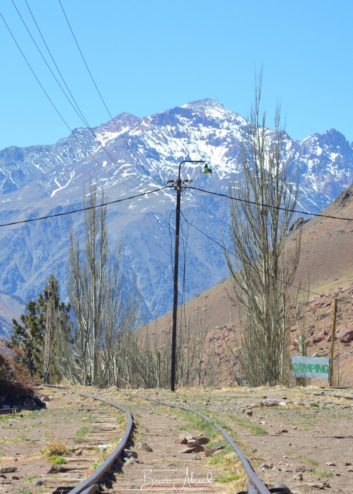 The towering Andes Mountains with the remains of the tracks from the Transandine Railway