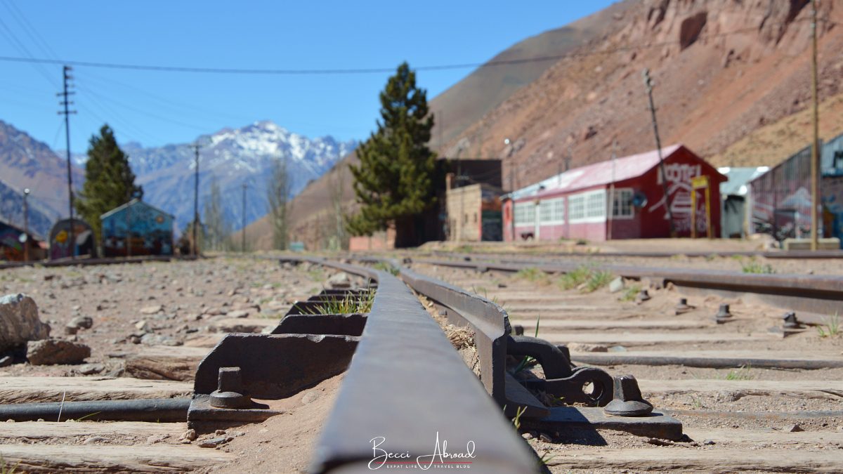 A view of the Transandine Railway remnants surrounded by the Andes Mountains