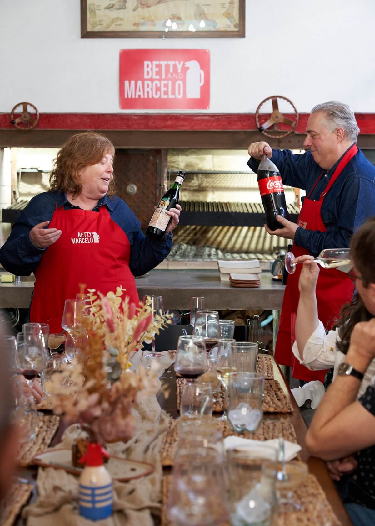Betty & Marcelo entertaining guests
