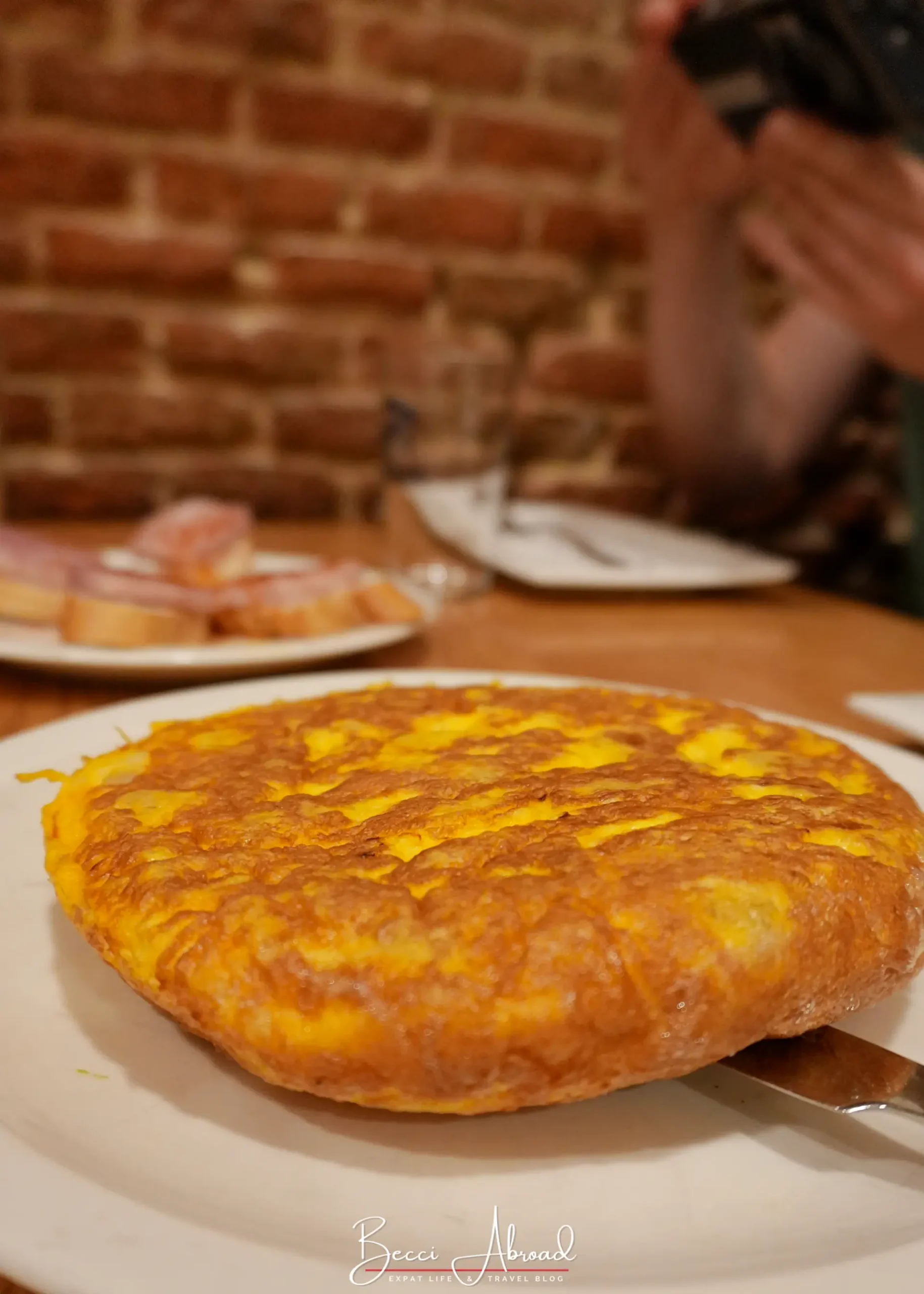 Tortilla española served without onion at a traditional tapas bar on Calle Ponzano