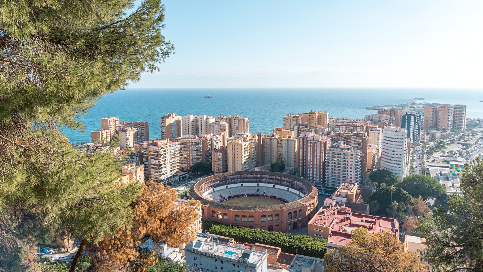 View over Málaga’s bullring and coastline on a sunny winter day
