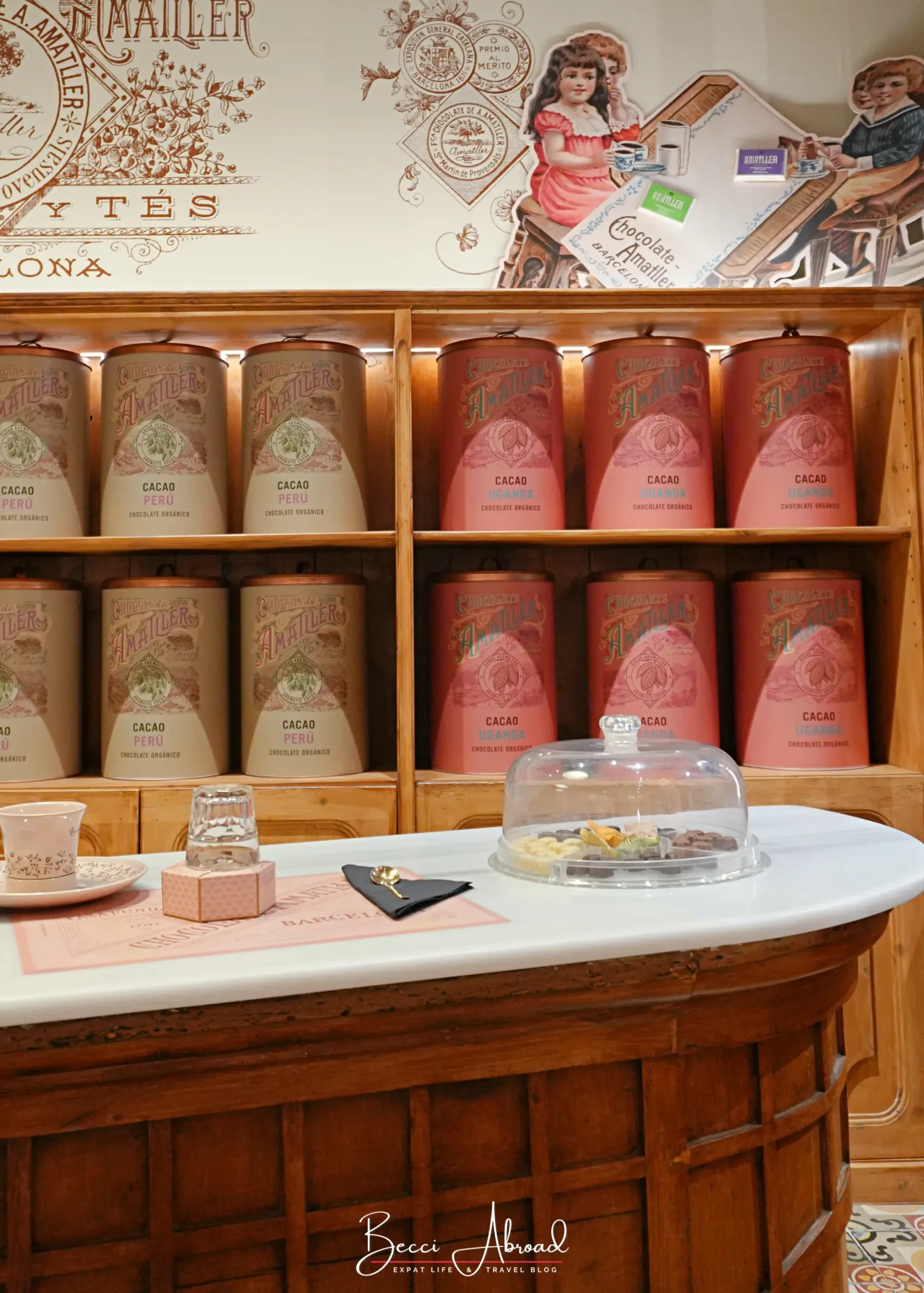 Wooden counter and chocolate tins inside the Chocolate Amatller store in Barcelona