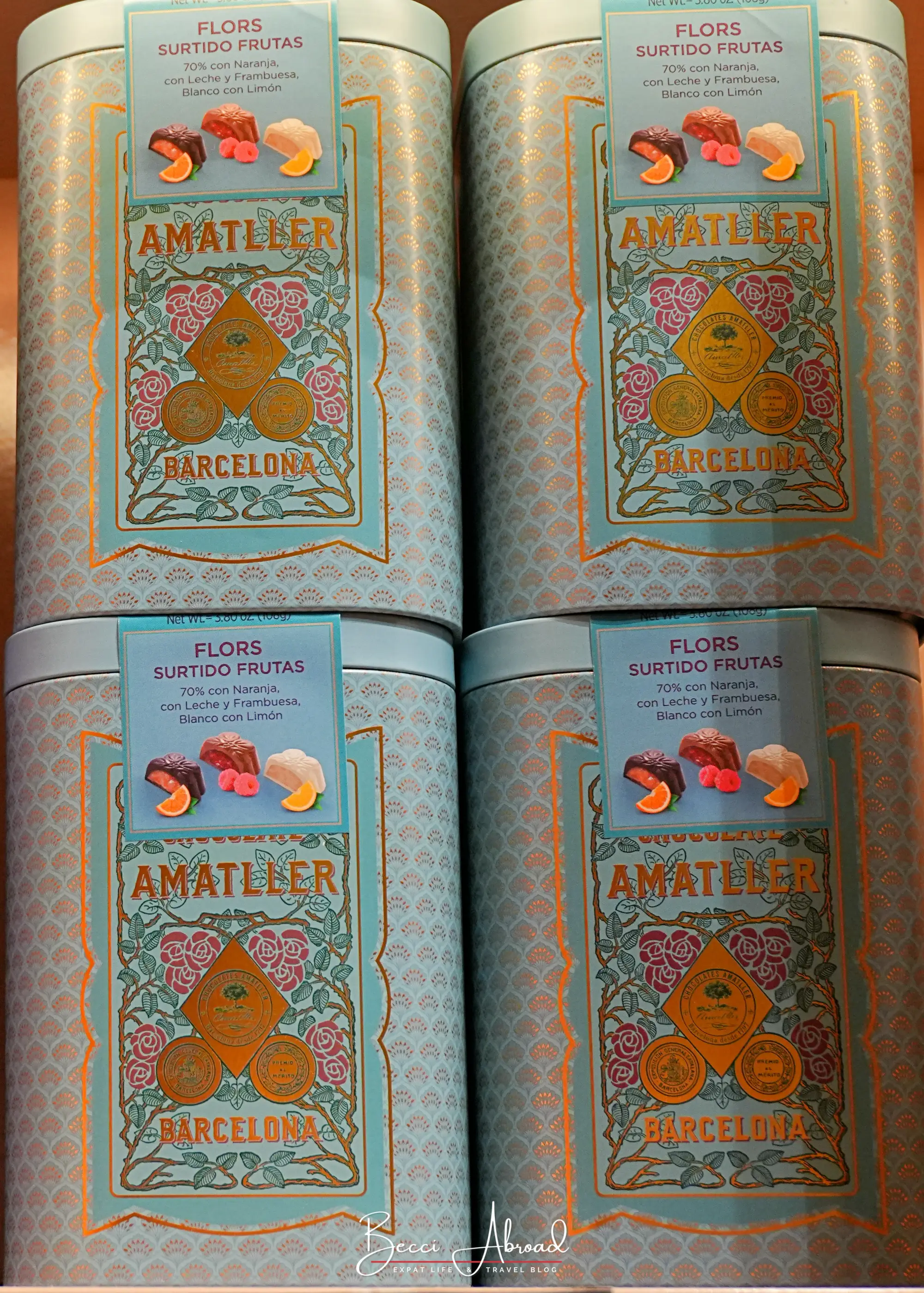 Stacked Chocolate Amatller flower chocolate tins with Art Deco packaging