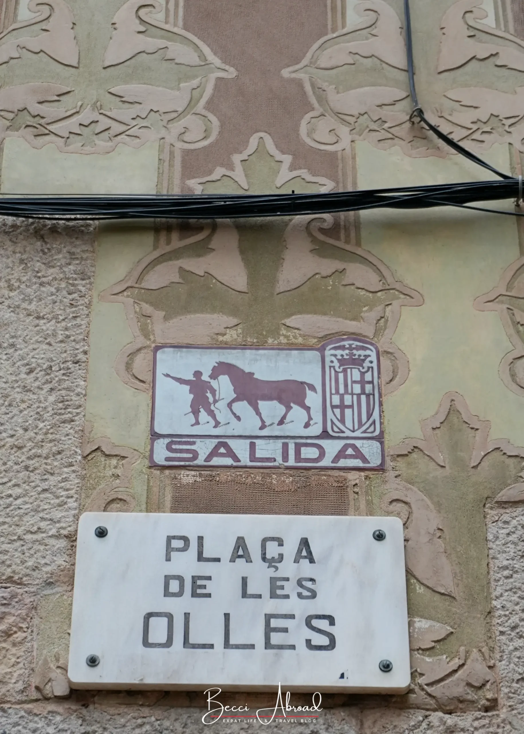 Plaça de les Olles street sign in El Born, Barcelona, where the Chocolate Amatller Experience takes place