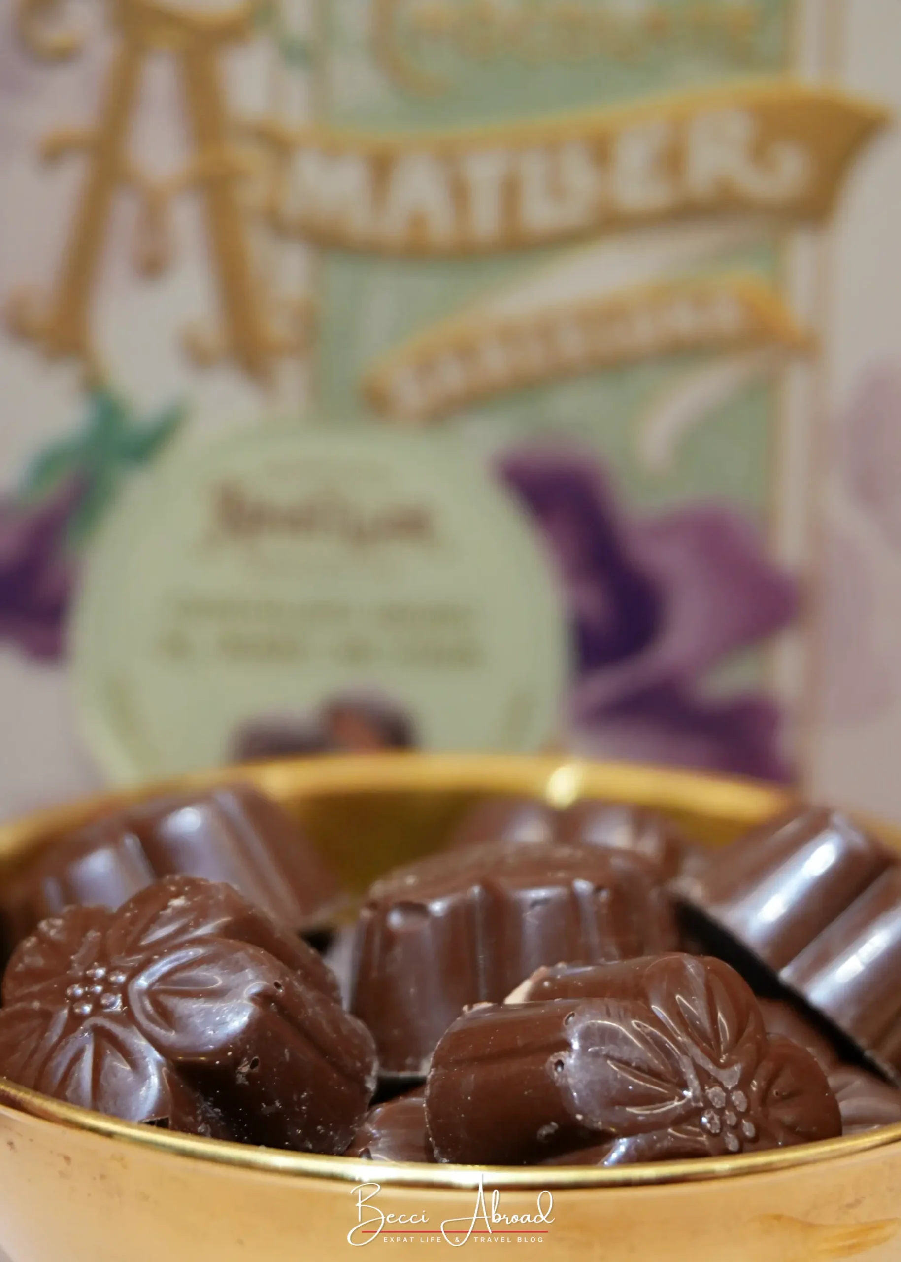 Chocolate Amatller cava chocolates in a gold bowl