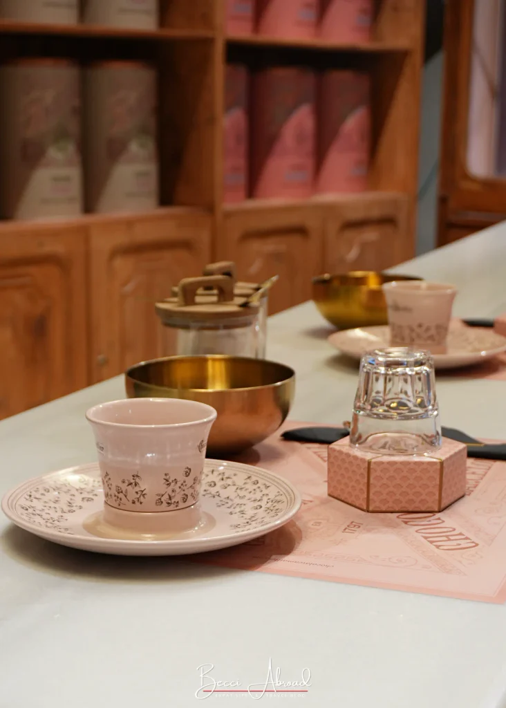 Traditional Spanish hot chocolate cup and saucer on the counter of the Chocolate Amatller store in Barcelona