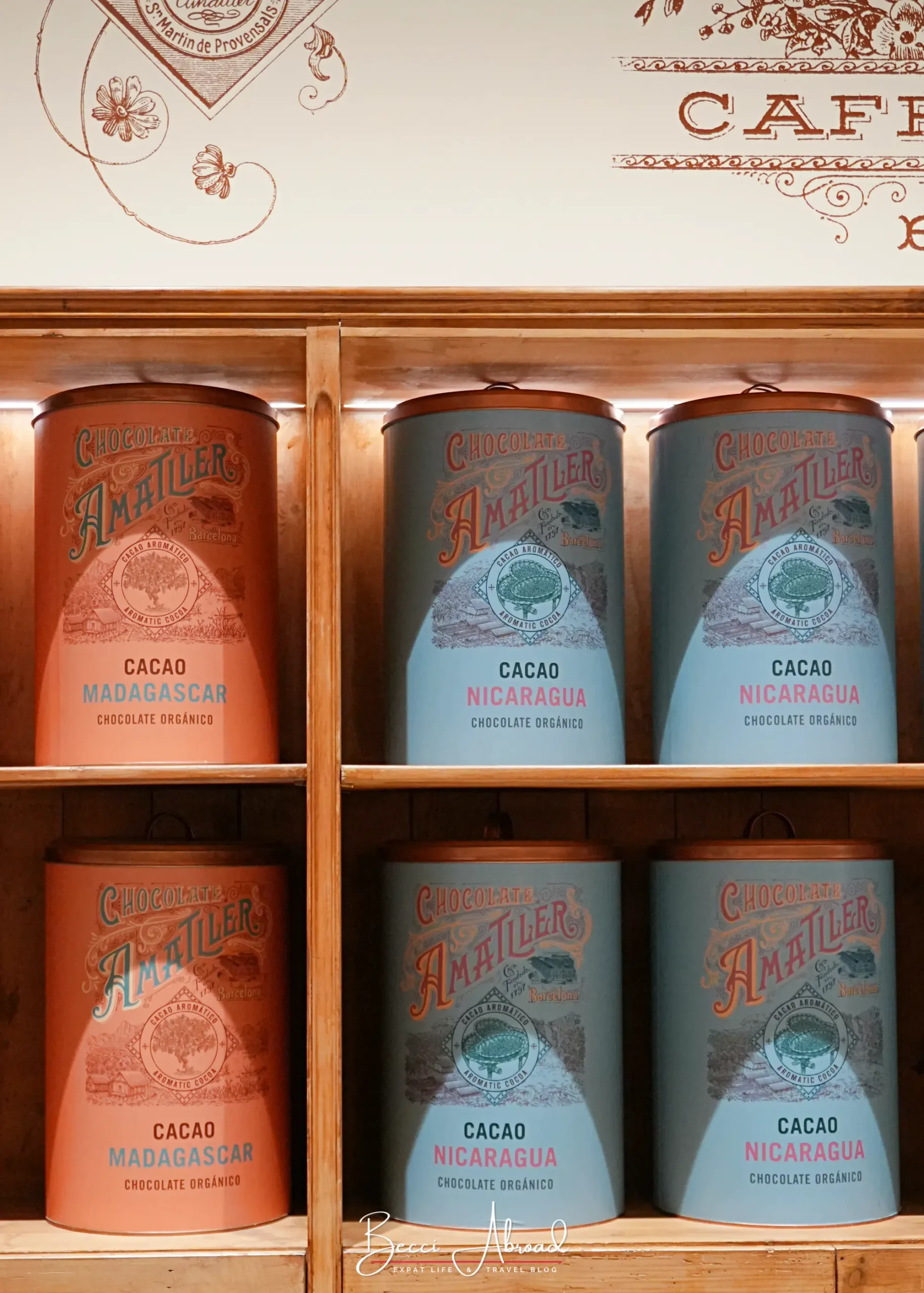Tins of Chocolate Amatller cacao from Madagascar and Nicaragua on a shelf