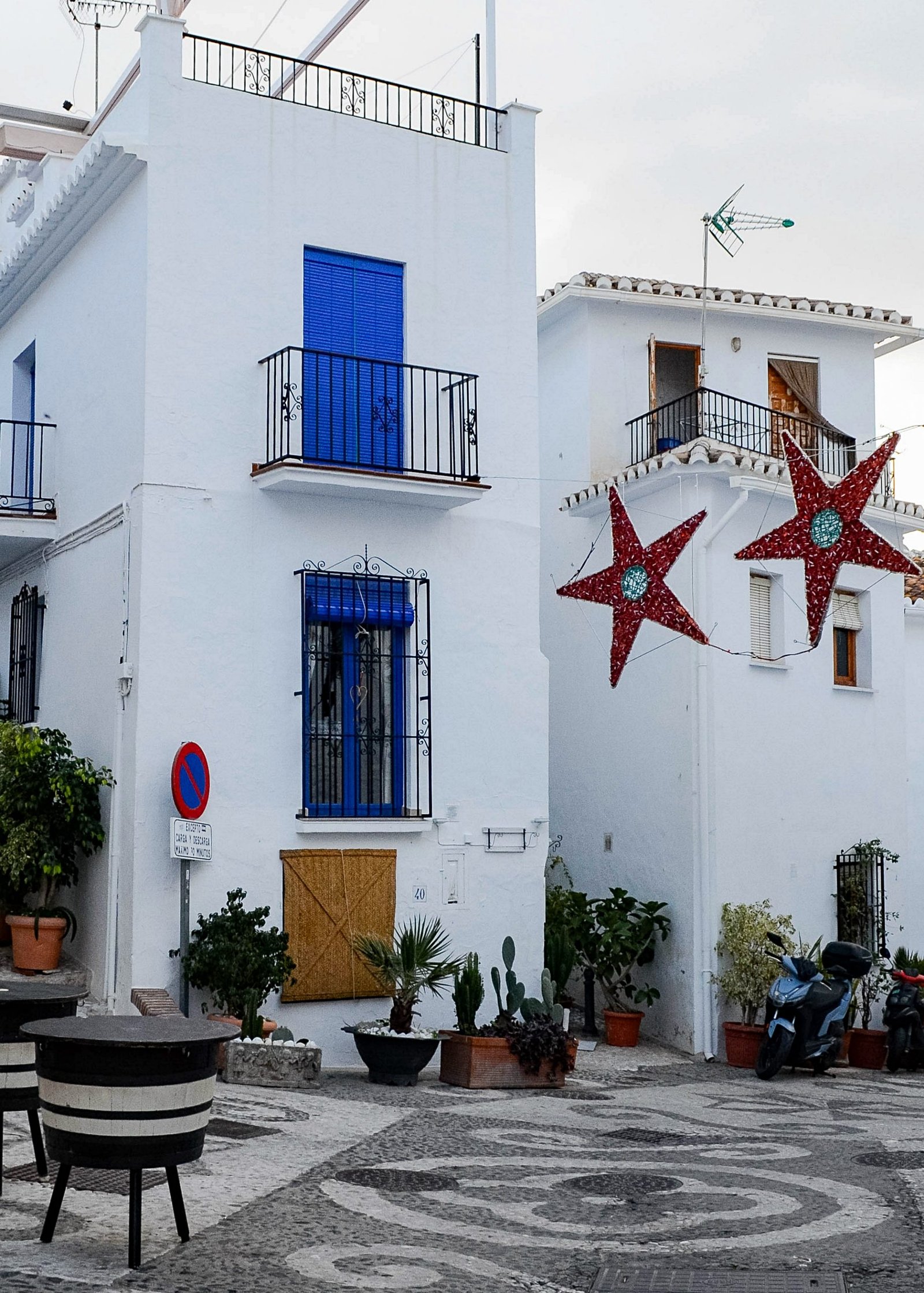 Whitewashed houses and balconies in Frigiliana, a pueblo blanco near Málaga